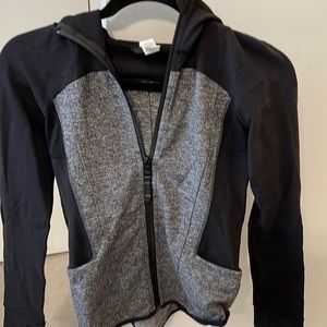 Athletic gray and black zip jacket with hood